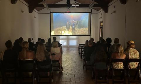 People watching a short film at the festival