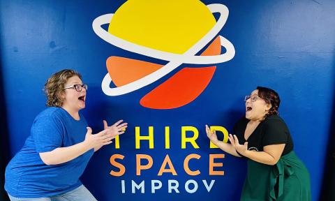 Two improvisers playing together at Third Space Improv.
