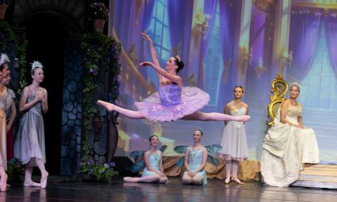 A ballerina leaping in the performance, "Rapunzel"