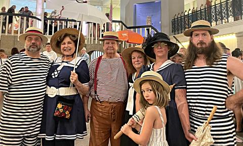 Models dressed in swimwear from the late 1800s