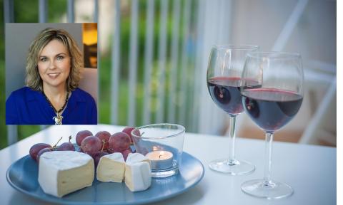A display of wine and cheese, with an author inset in the upper left