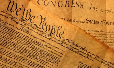 Two copies of the Declaration of Independence stacked askew