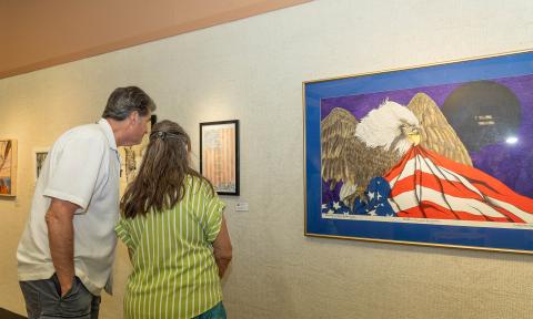 Visitors looking around the exhibit