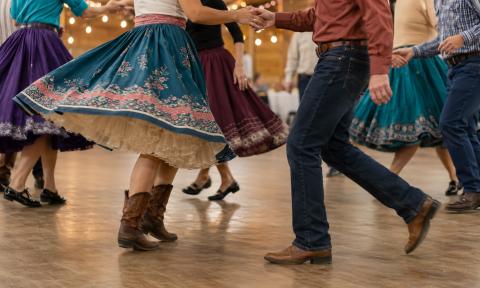 A couple dancing at a hoedown