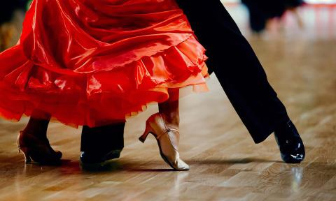 Partners dancing the merengue