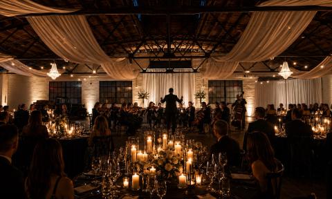 A live orchestra performing inside The Venue
