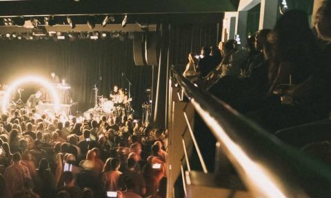 The crowd during a show at Ponte Vedra Concert Hall, showing floor seating, balcony, and stage