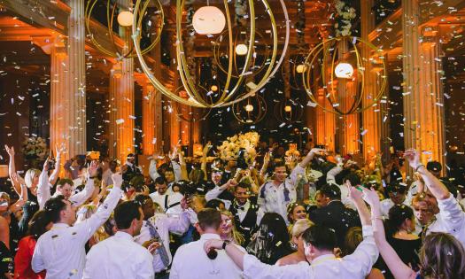 wedding guests dancing at the reception