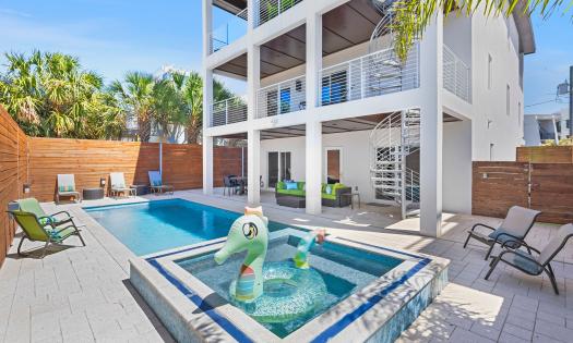 The patio and pool at one of Euphoria Vacation Homes on Anastasia Island