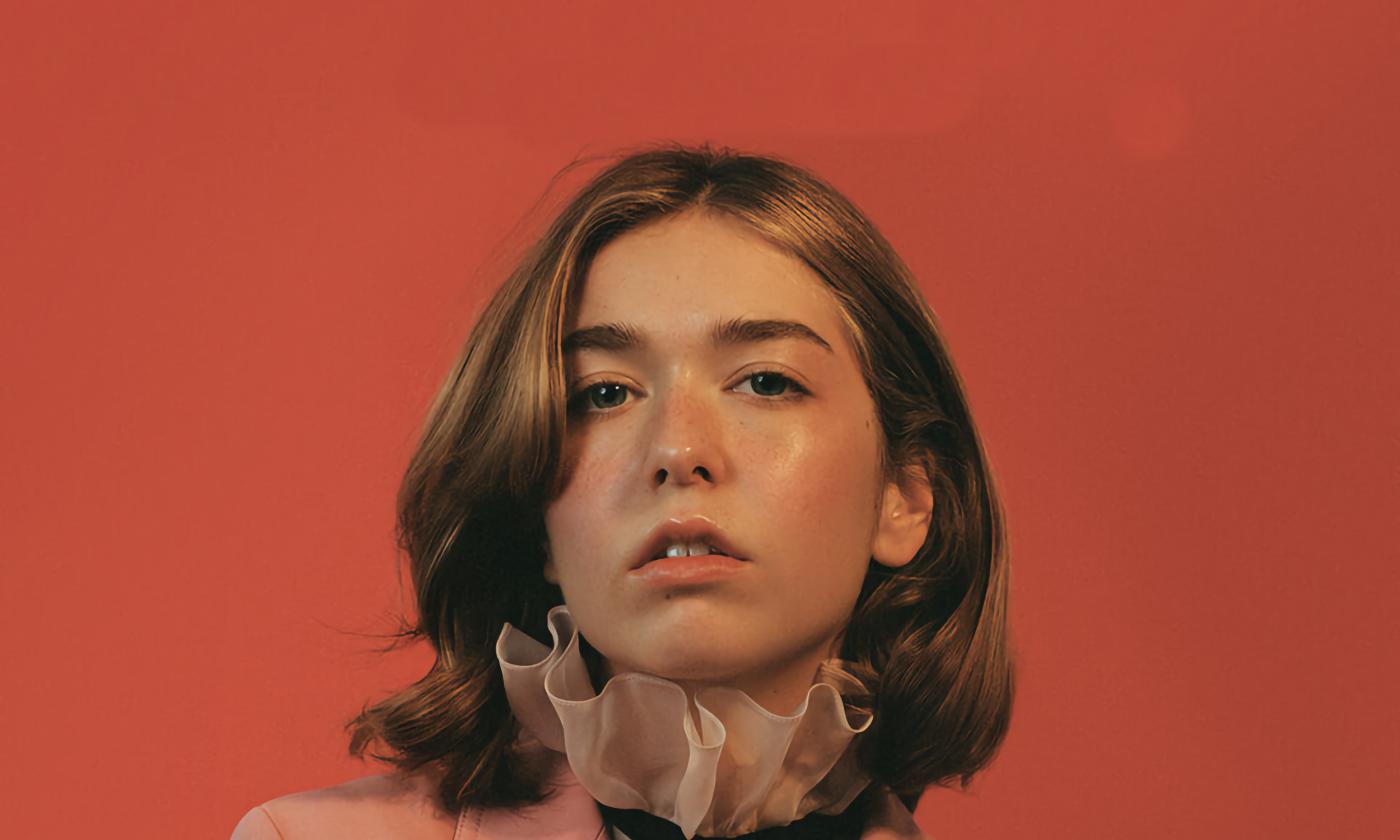Lindsey Jordan, against a red background for promotion of her album "Valentine"