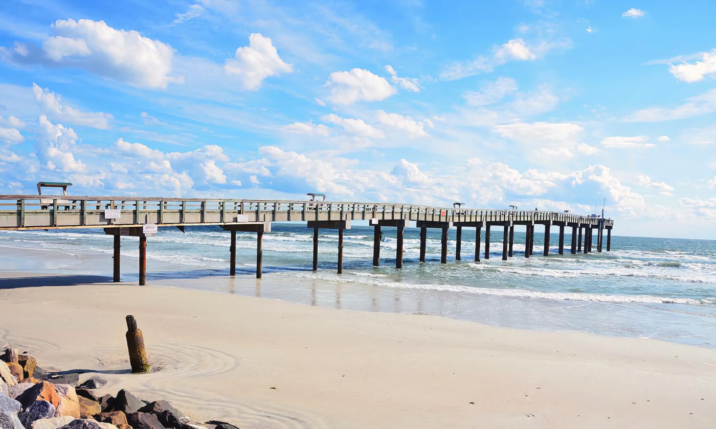 The St. Johns County Pier on St. Augustine Beach on a beautiful day.