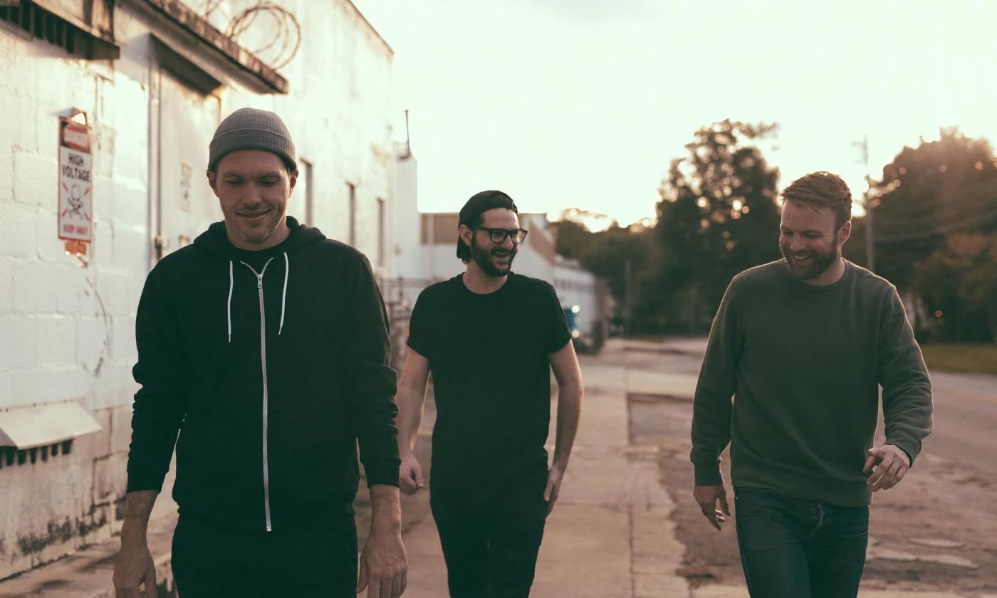 Stranger Wolf band walking down a street together