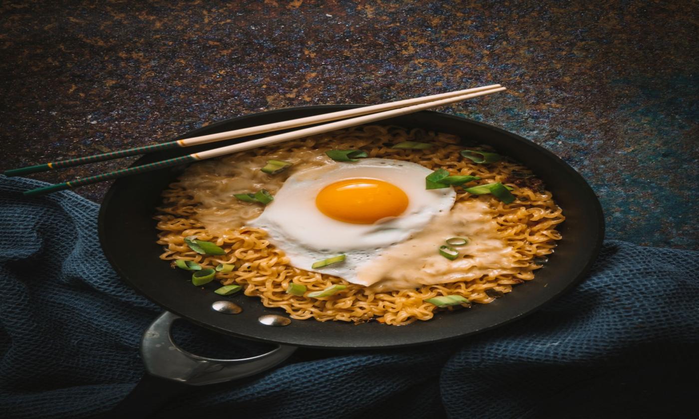 Japanese Ramen is positioned on a table.