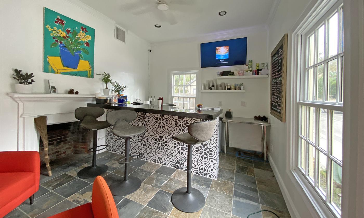 Kafe Kava counter with stools where coffee, teas, kava, and pastries are served in downtown St. Augustine. 