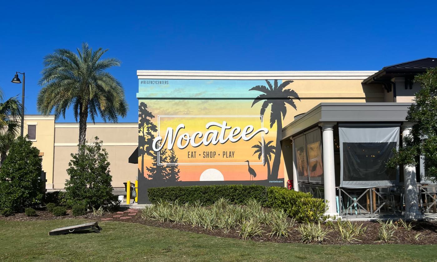 Sideview of the Treylor Park Restaurant with artwork that reads, "Nocatee." 