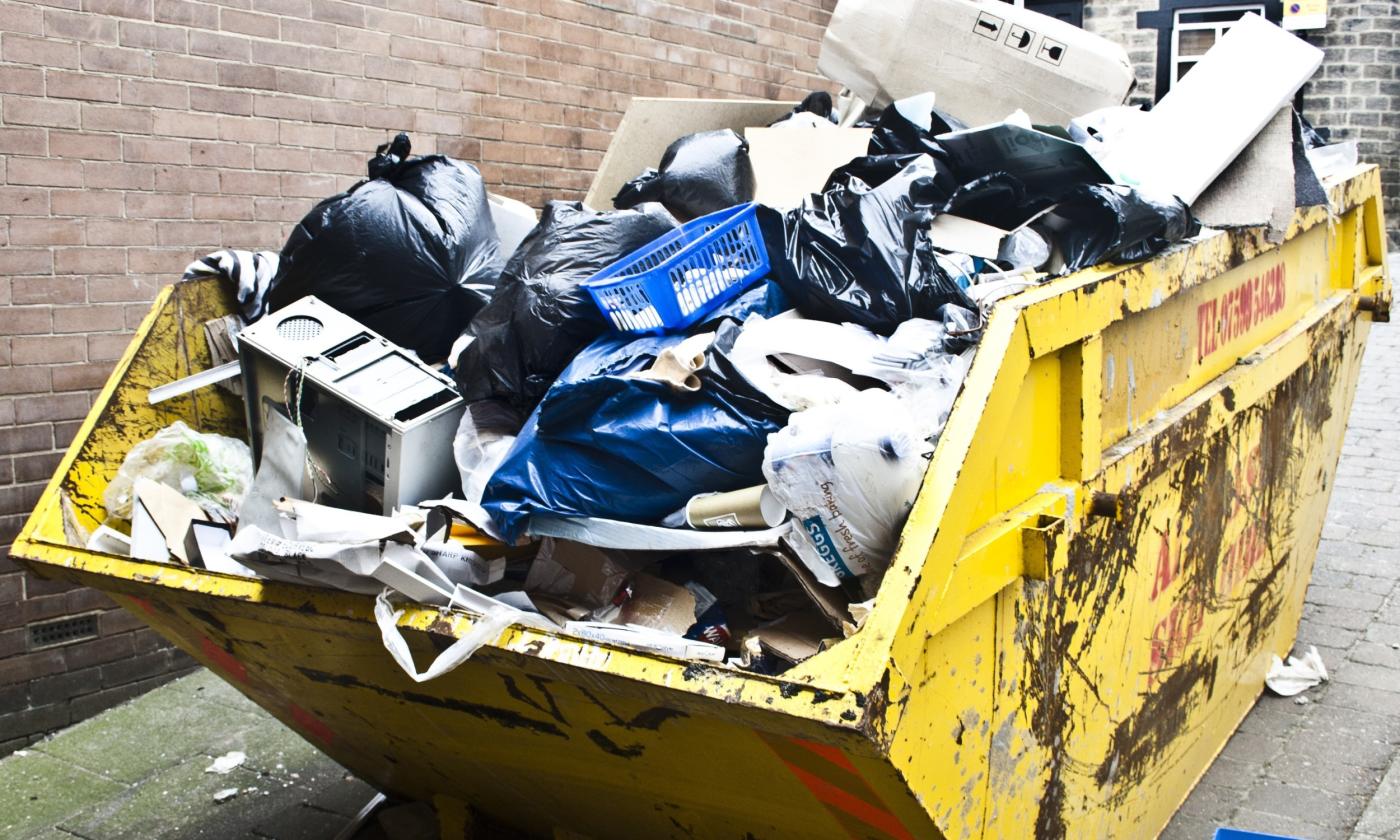 dumpster filled with junk