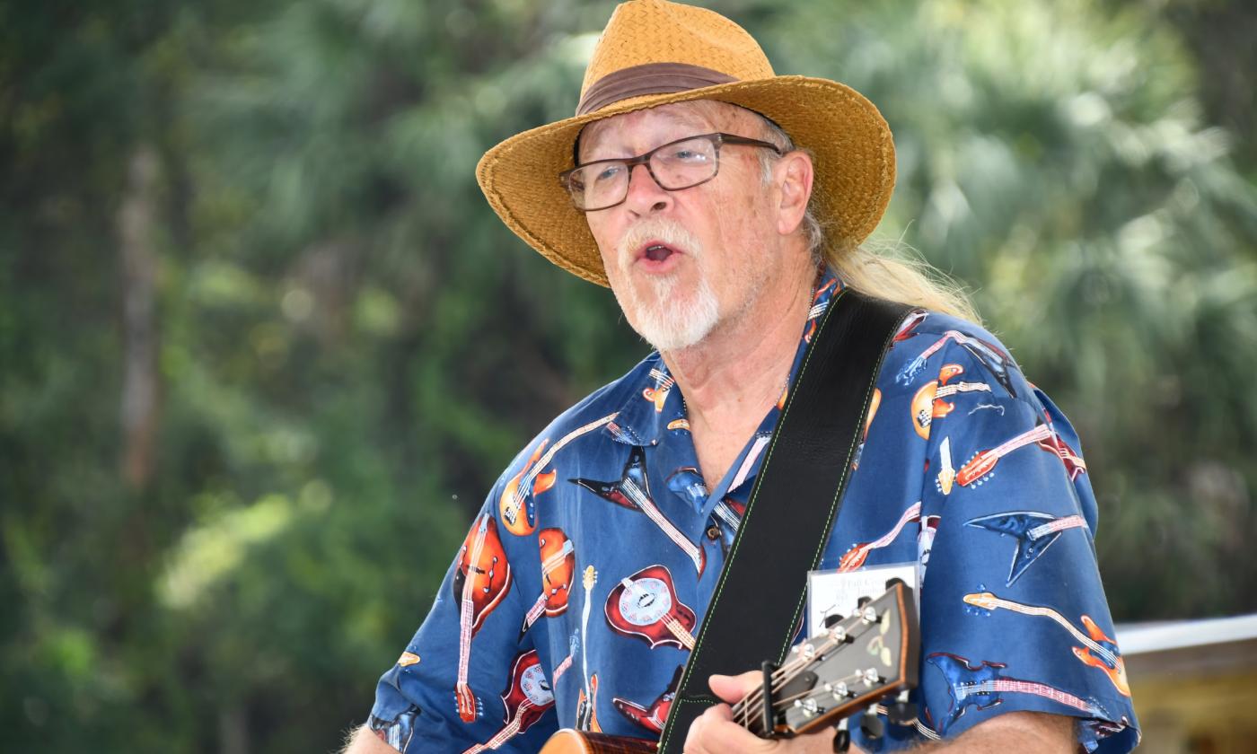 Tom Edwards, playing and singing. 