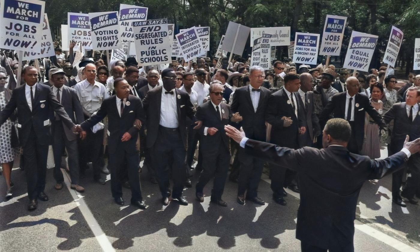A group of African American men rally at a civil rights protest.