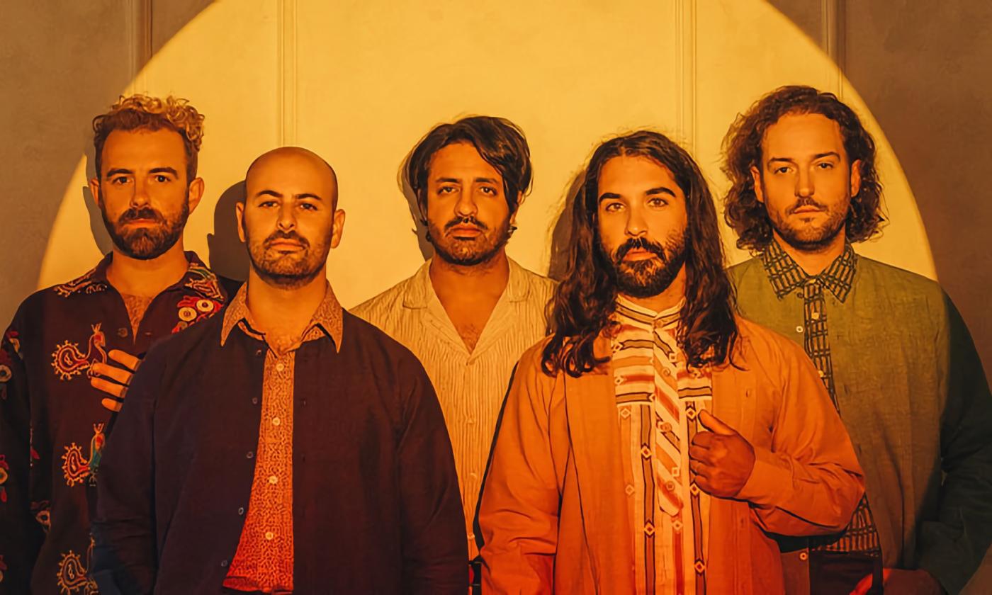 Young the Giant poses for the camera. 