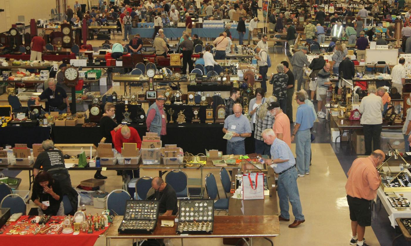 Visitors walk through aisles for the event.