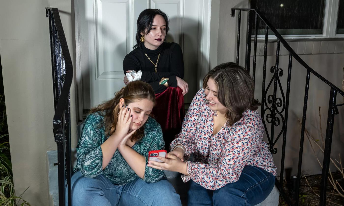 Three young actors in a scene of "Cry it Out," presented by Flagler College