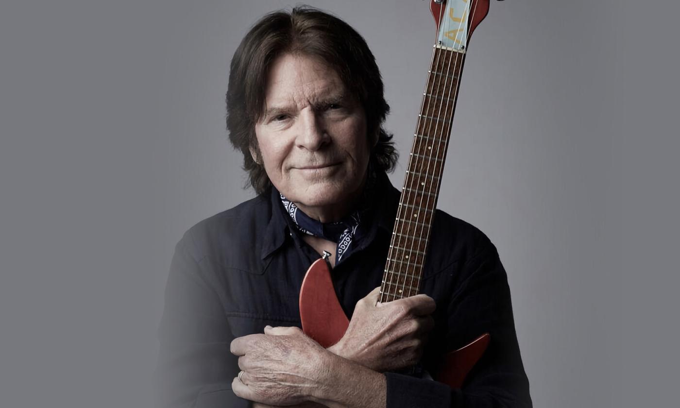 John Fogerty poses with his guitar
