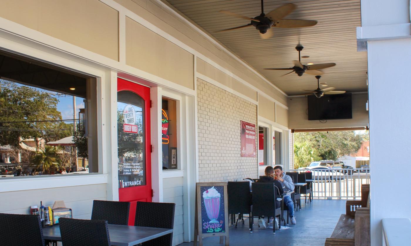 The porch and entrance to One Twenty Three Burger House on King St. in St. Augustine, FL