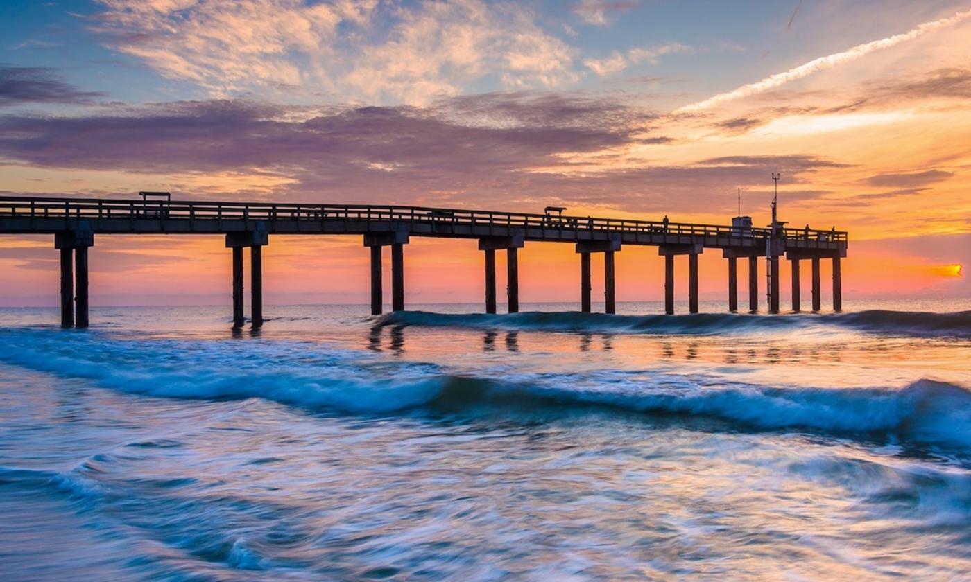The St. Johns County Ocean and Fishing Pier at sunrise