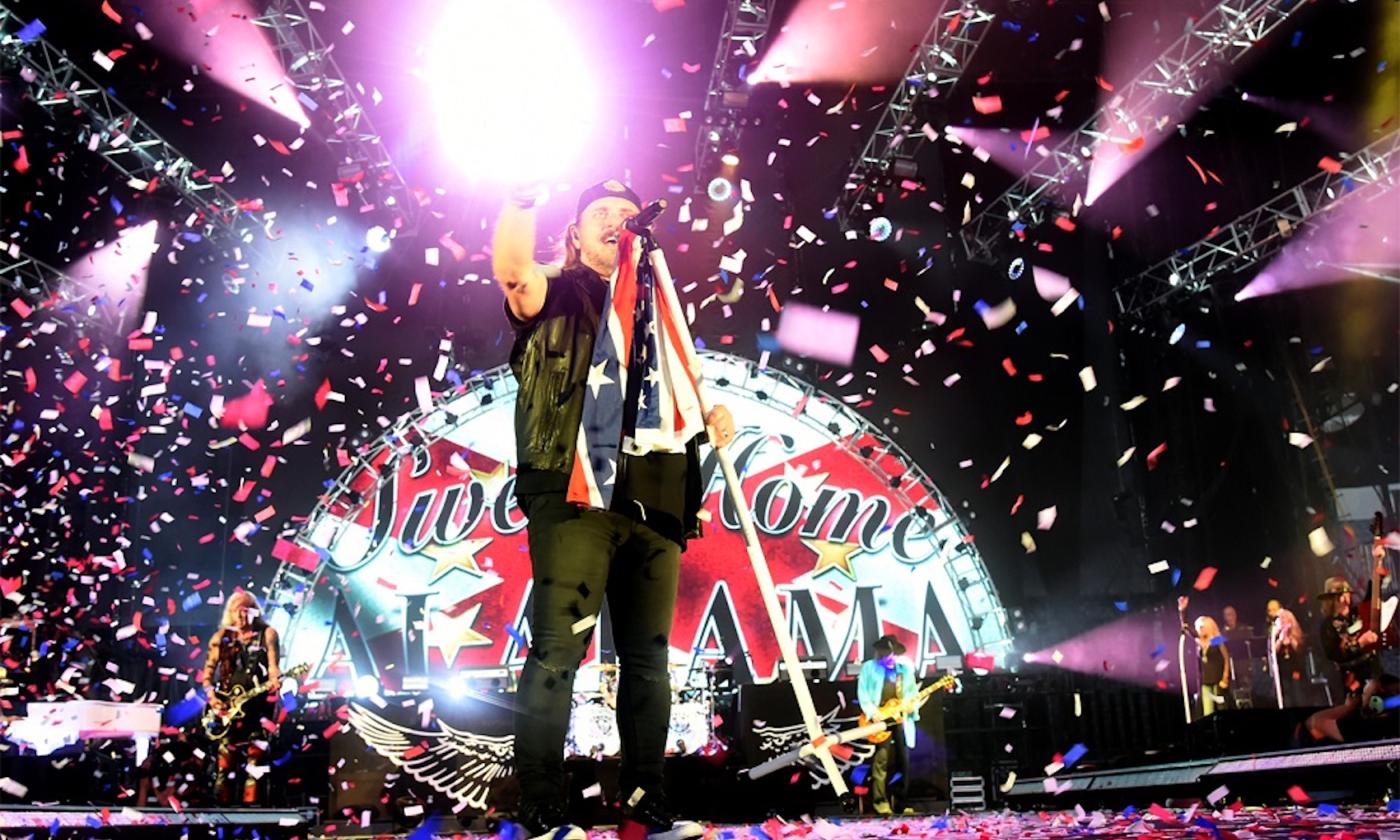 Lynyrd Skynyrd performs on stage. 