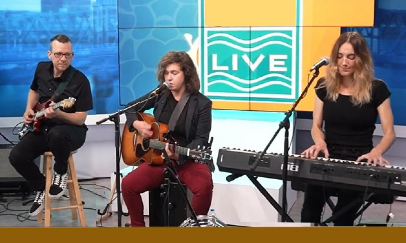The Tori Nance Trio playing electric guitar, acoustic guitar with pedal drum, and keyboards in Jacksonville, Florida.