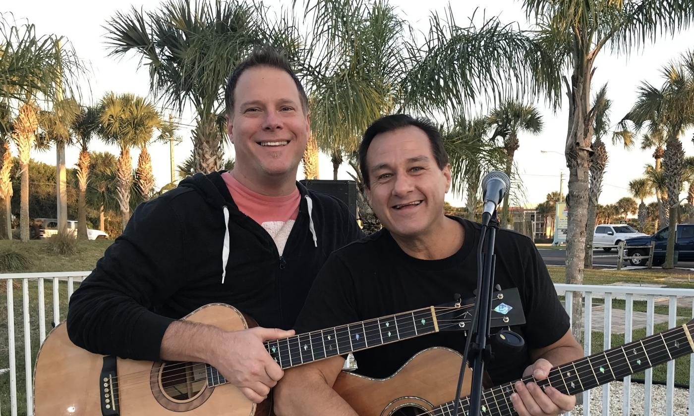 Dion & Collins on a music deck before a show