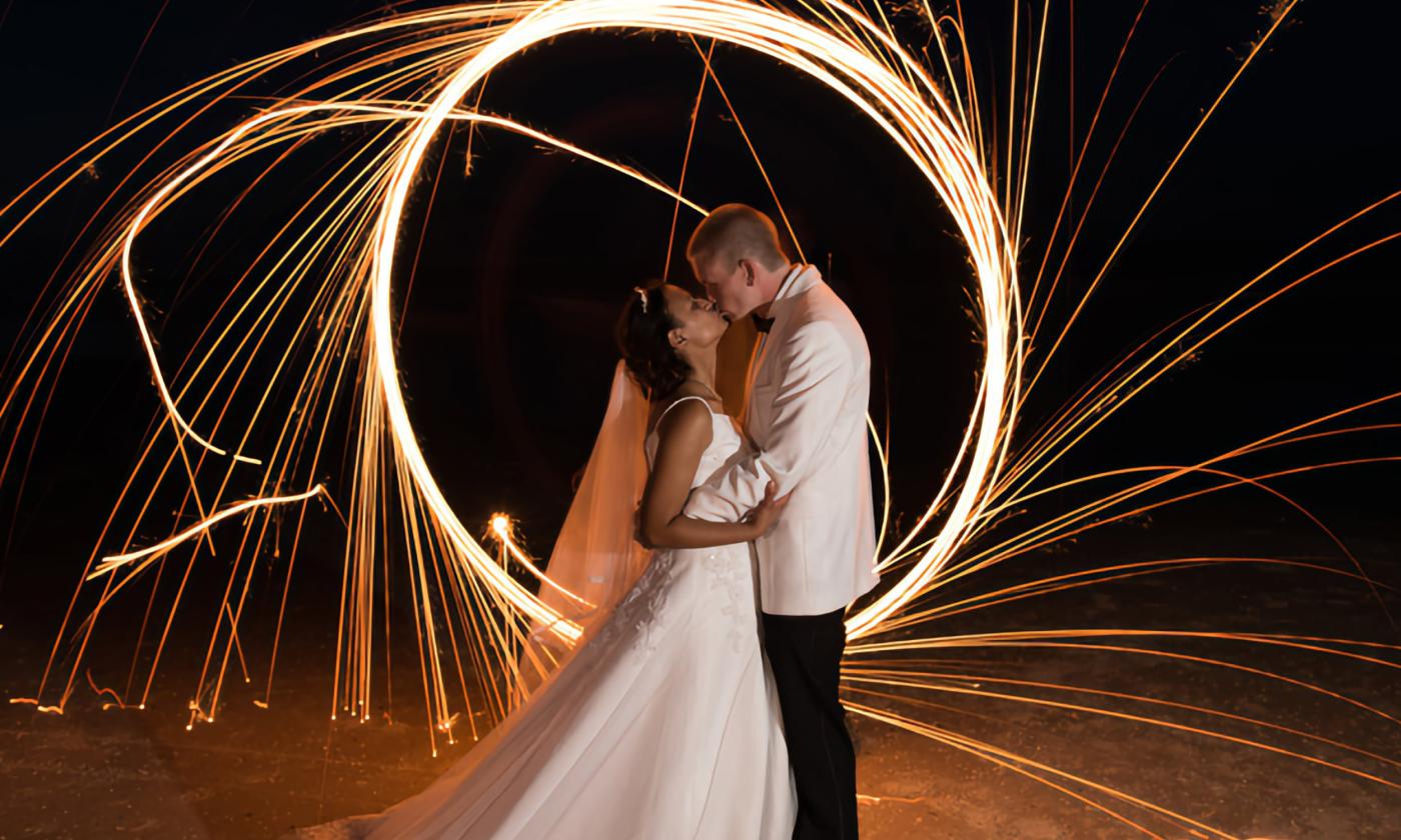 Bride and Groom photographed at night with sparkler effect