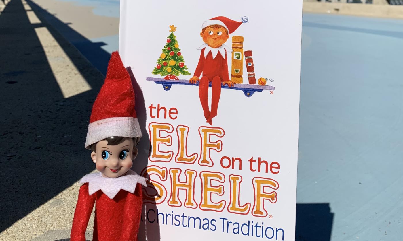 The Elf on the Shelf cover art and toy