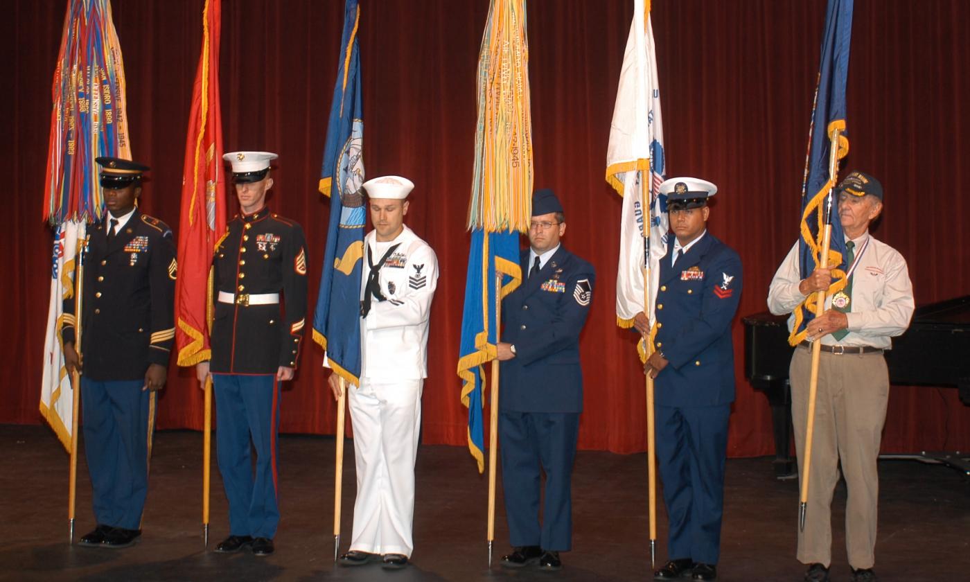 A Veterans Day Ceremony taking place on stage
