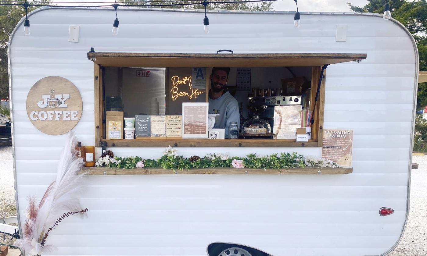 The exterior of A Cup of Joy truck at the Marina Munch