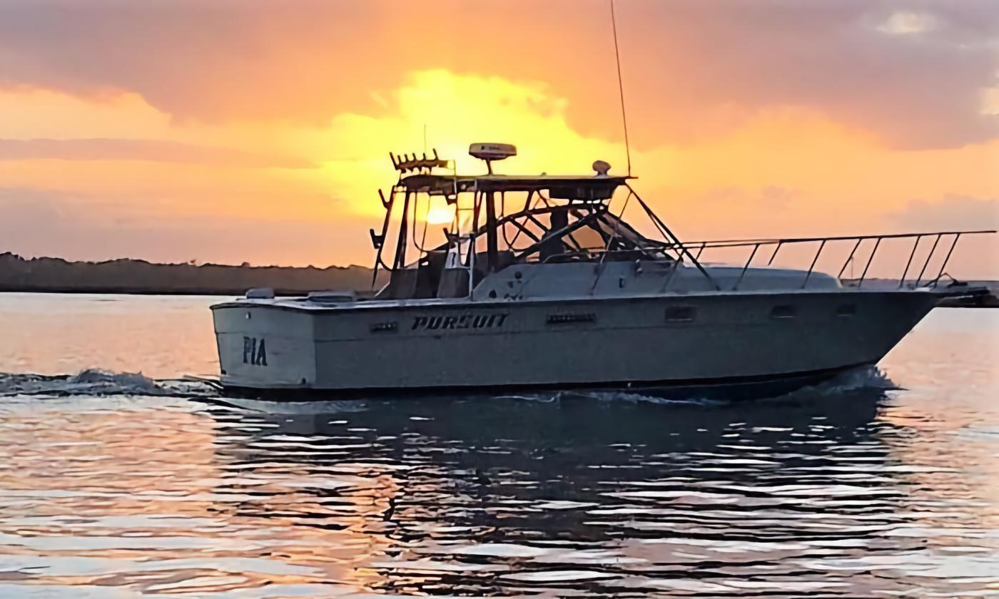 PIA & Me's charter out on the water during sunset