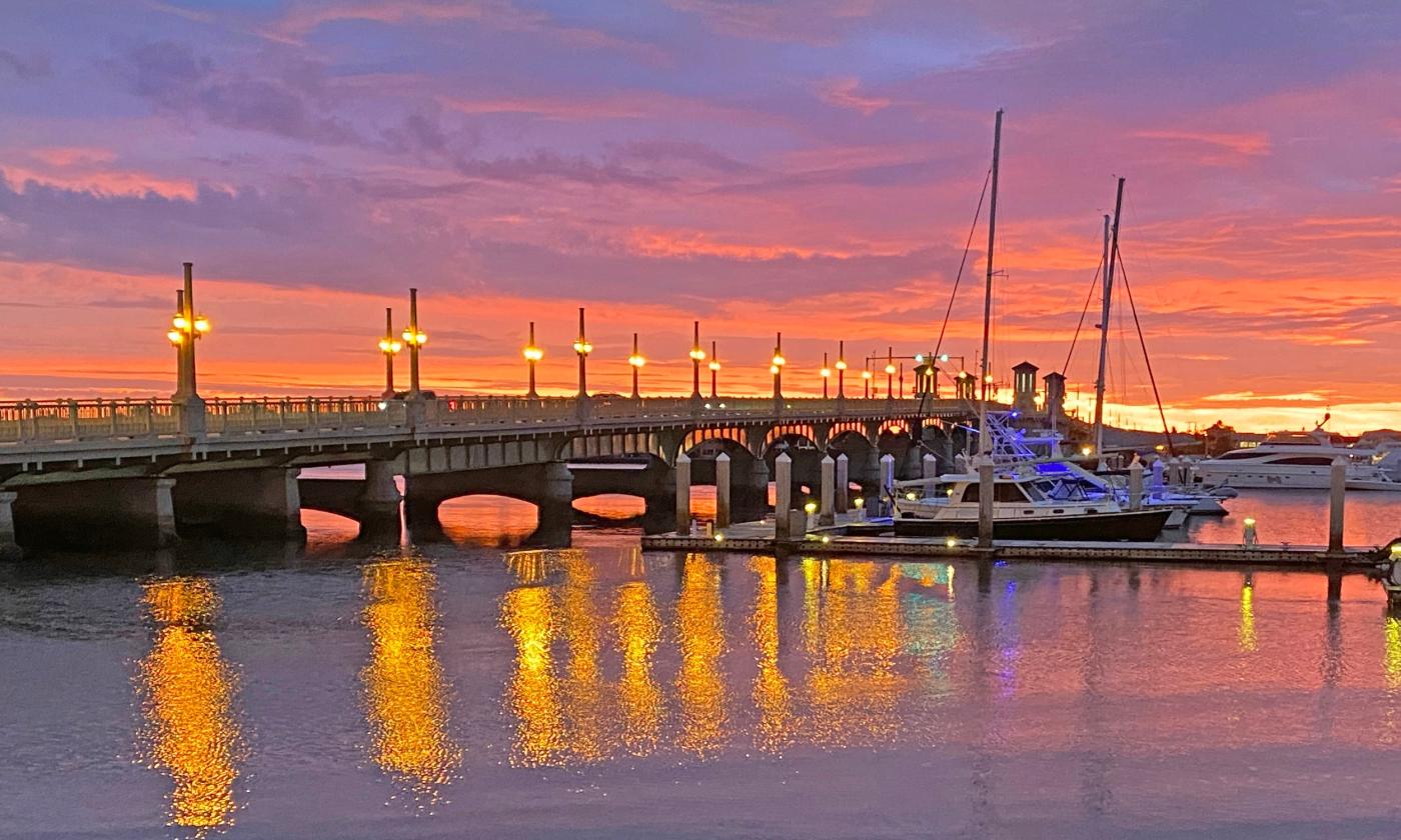 A brilliant sunrise over the Bridge of Lions and St. Augustine City Marina