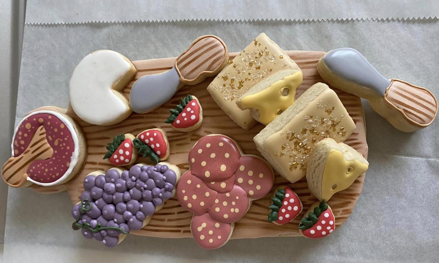 A charcuterie board themed cookie set