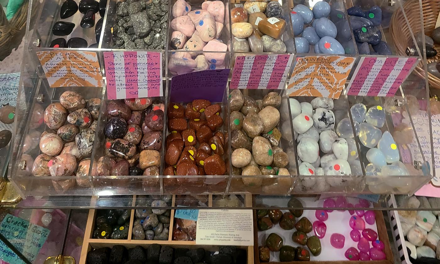 A variety of stones in organized in compartments for easy view