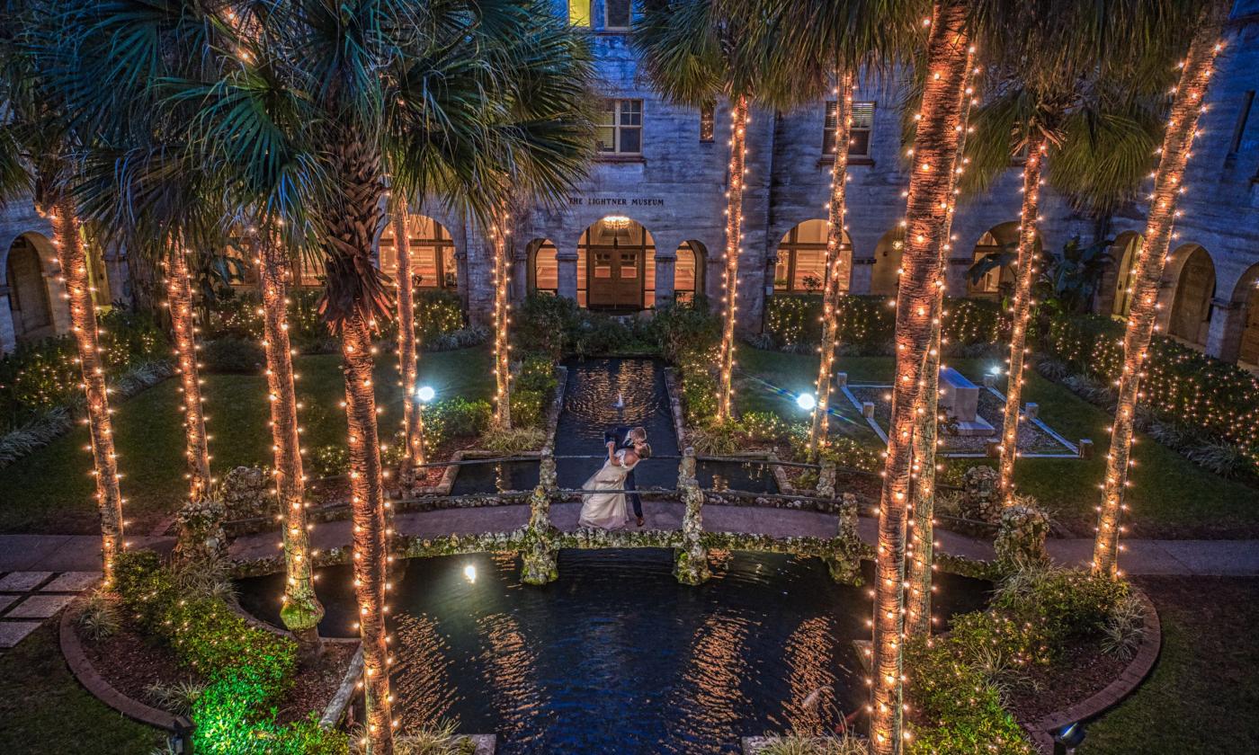 An overhead shot of a couple in the Lightner Museum courtyard