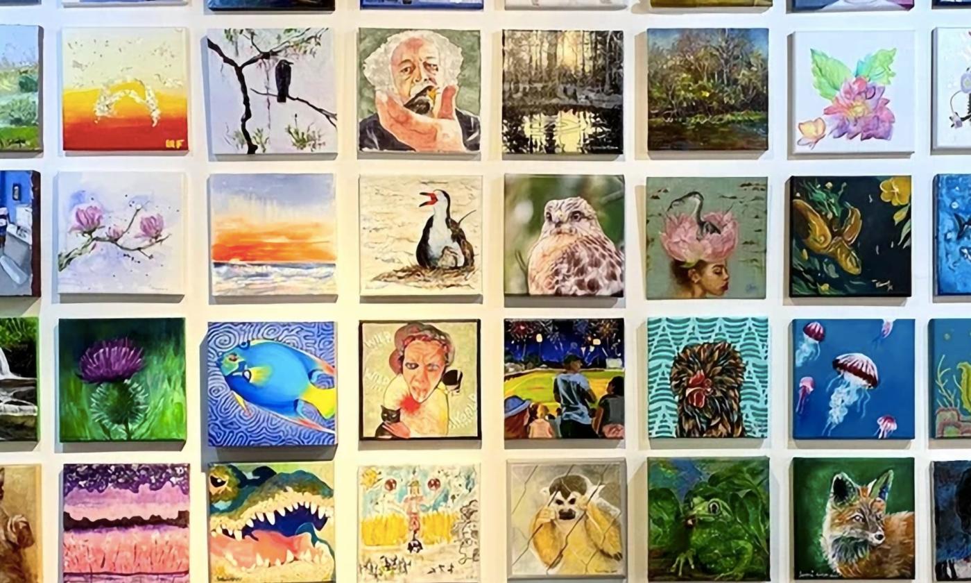 Wall display of artwork celebrating artistic influence at Butterfield Garage Art Gallery