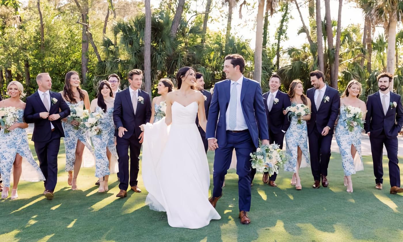 Bride, groom, and bridal party celebrating at The Yards in Ponte Vedra Beach