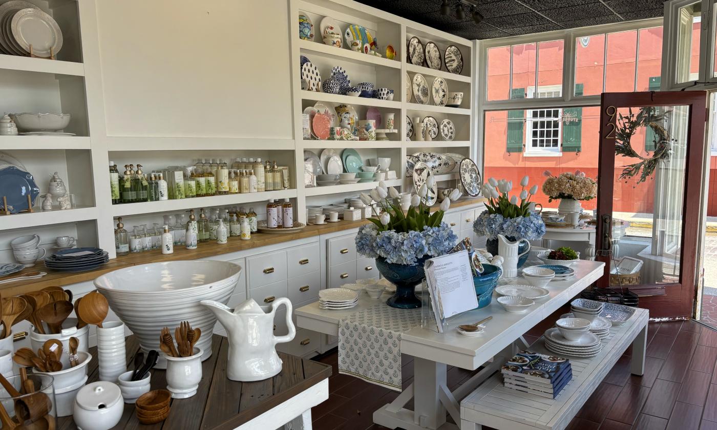 The open layout of the shop with dinnerware and vase decor
