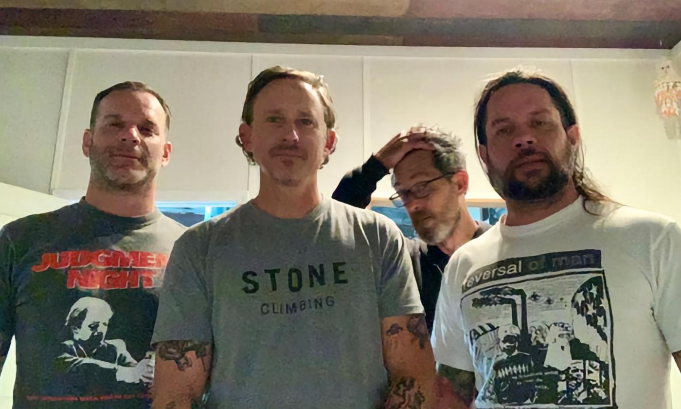 The four-person band of Dredger