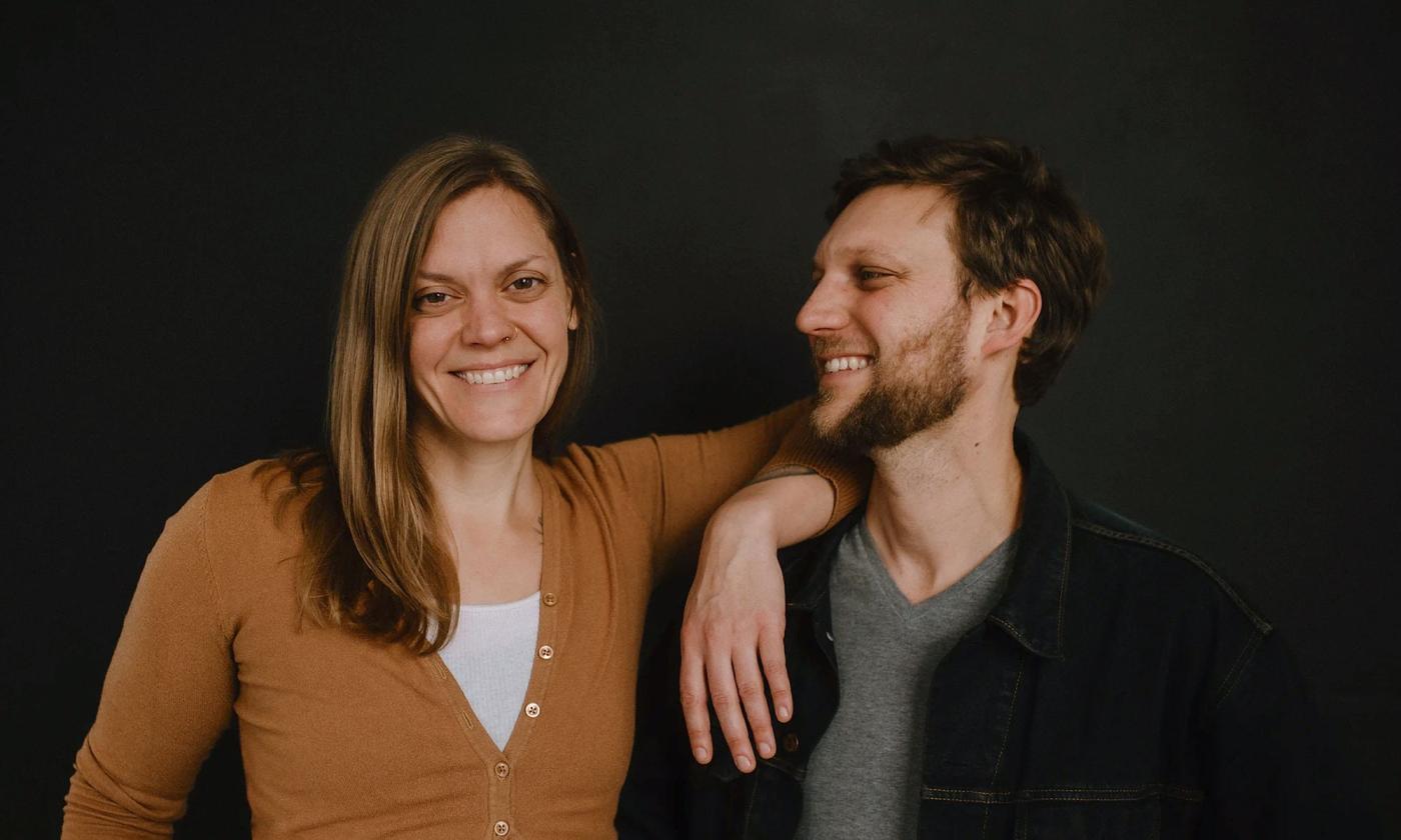 Rough & Tumble band standing together, smiling