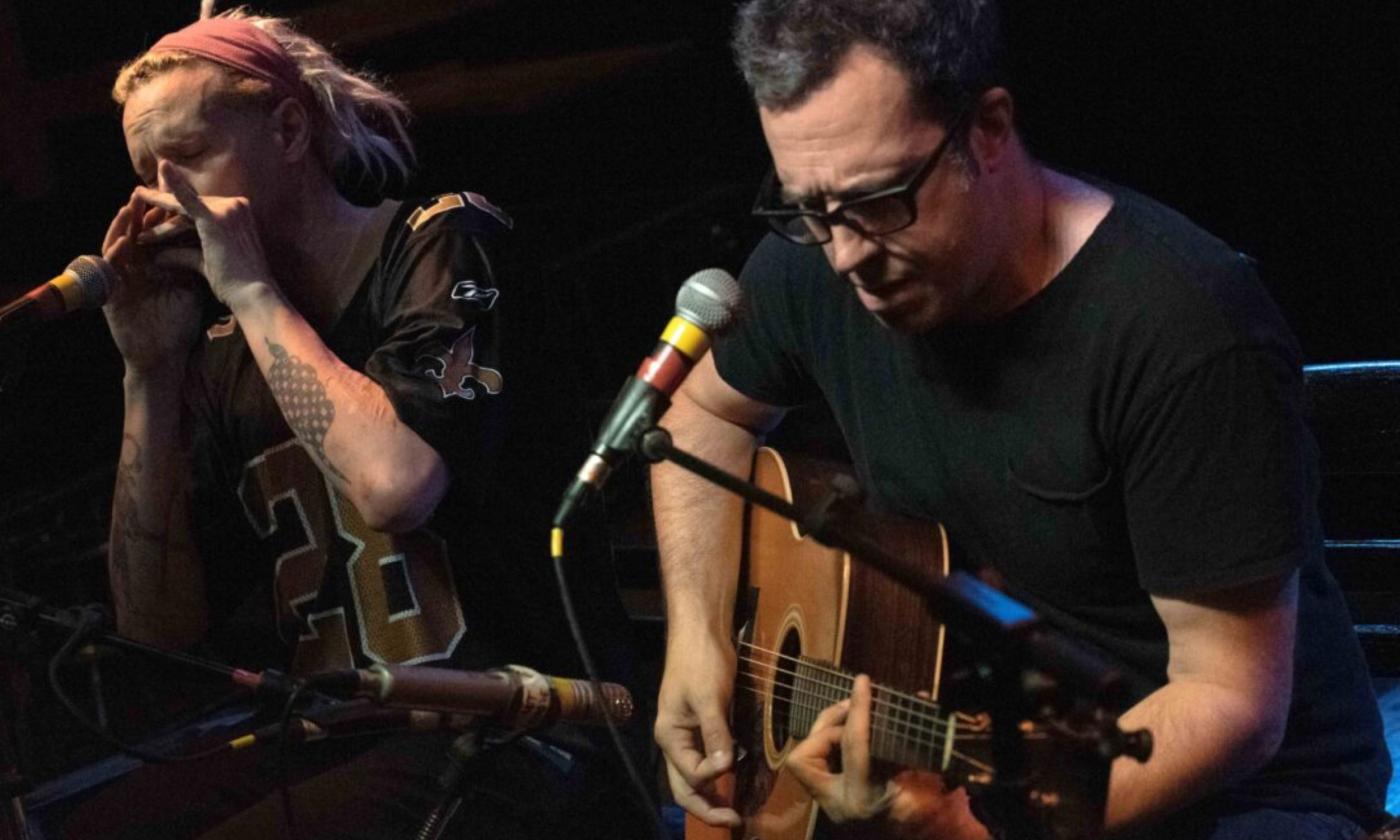 JJ Appleton and Jason Ricci perform live on stage.