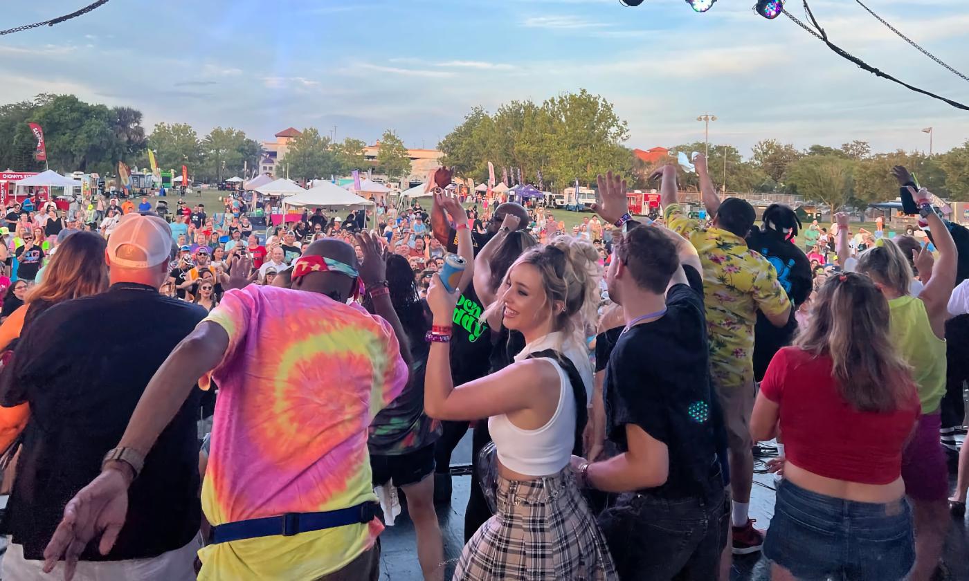 Audience members dancing at the As If! 90's Fest in 2024