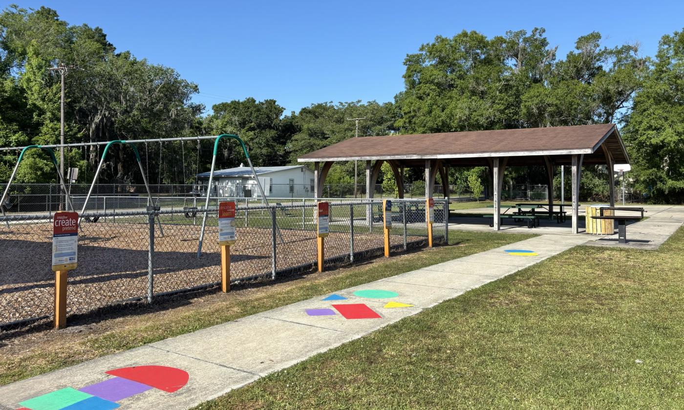 Colorful sidewalk designs leading to the picnic pavilion