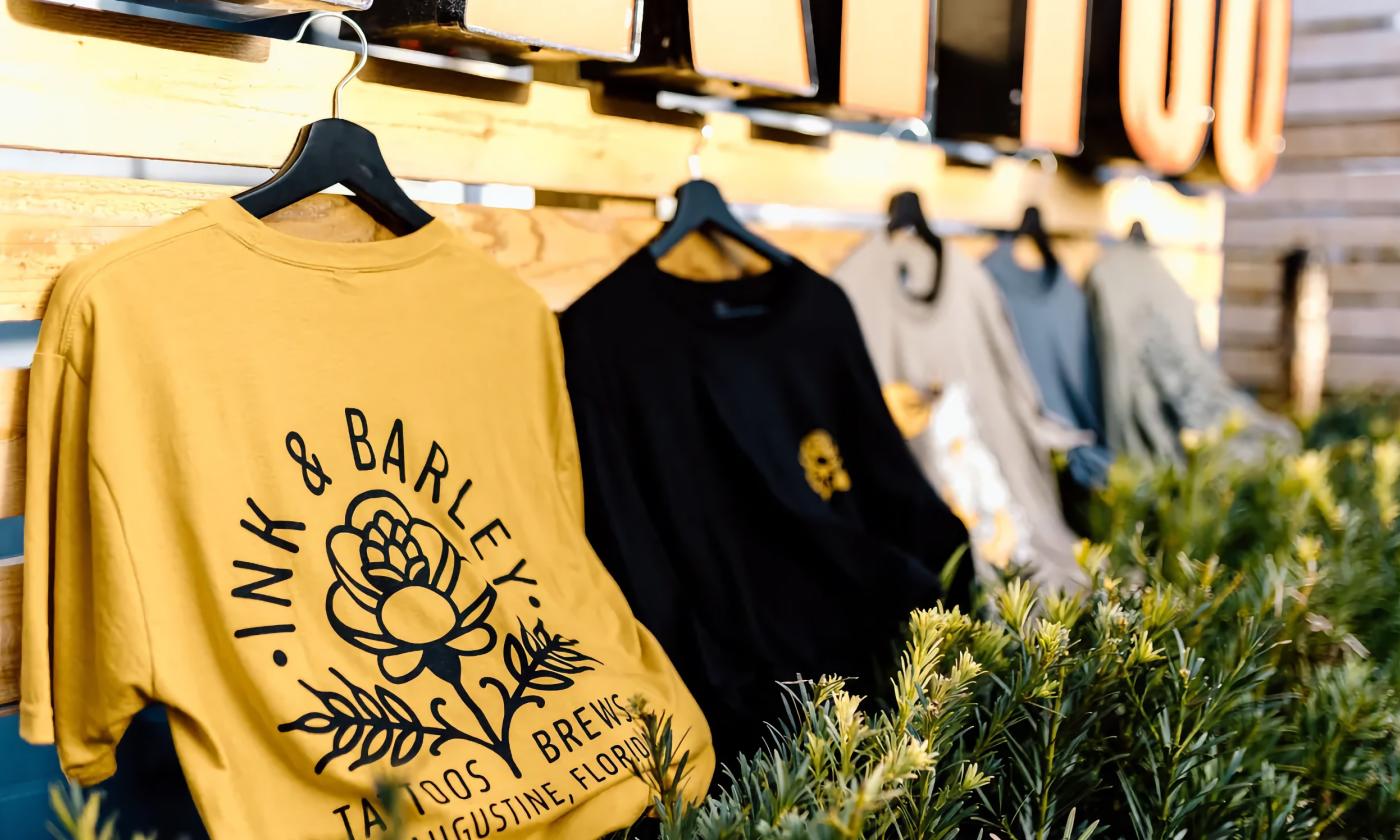 Ink & Barley branded t-shirts on display