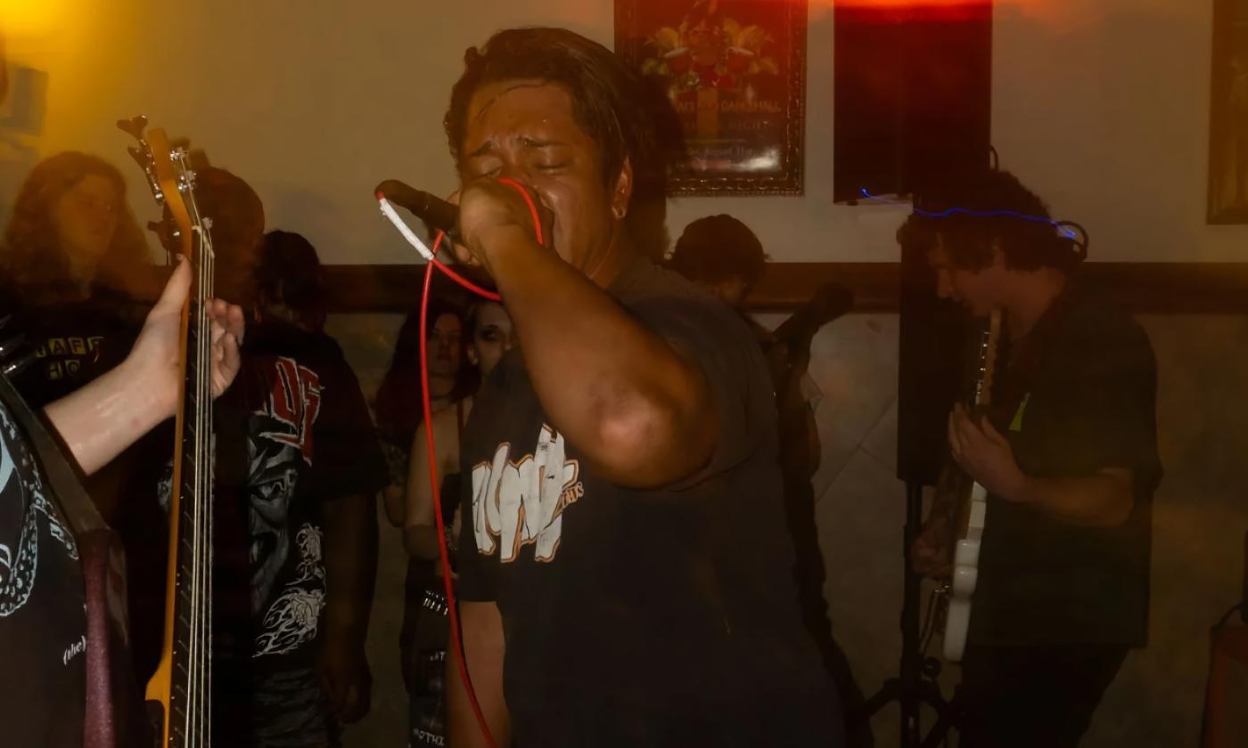 Between You & God performing with lead singer in the forefront
